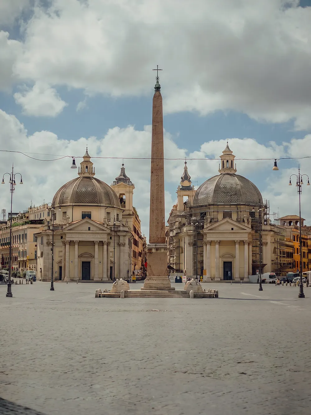 The same square after ClearShot Clean, empty except for the obelisk and churches